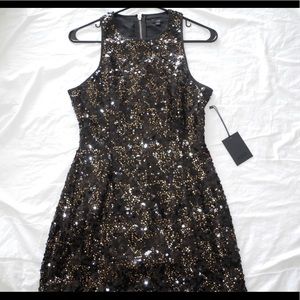 Black and gold mini sequin dress